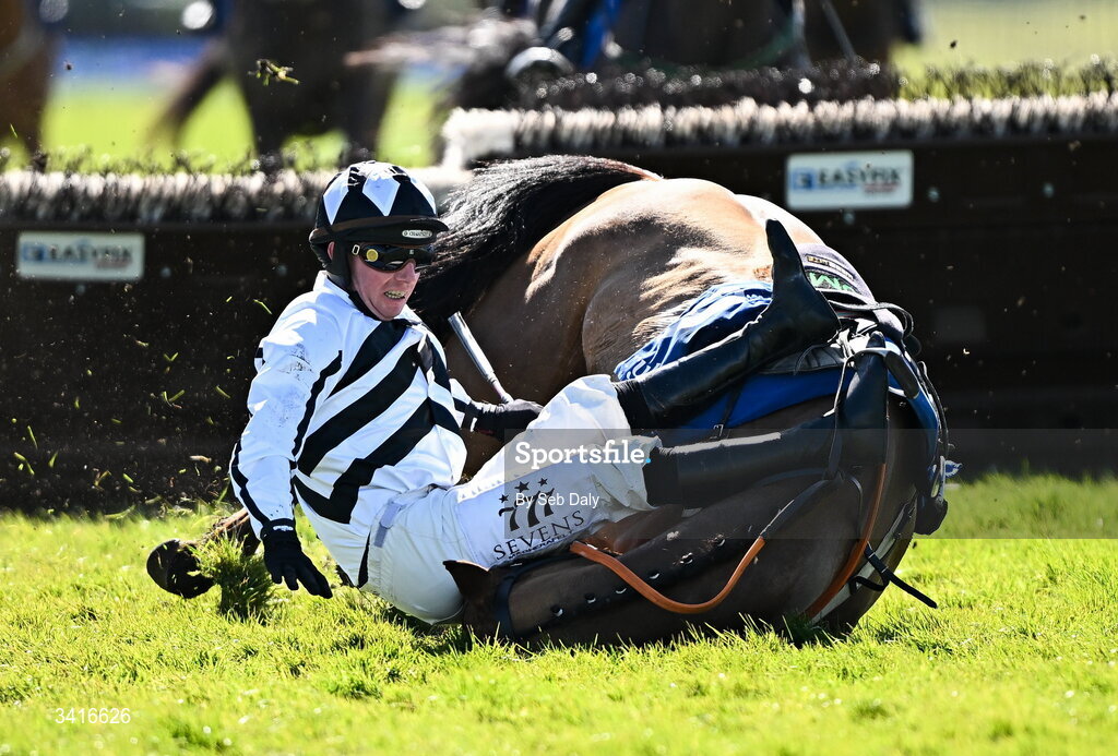 5 April 2026; Royal Soldier and jockey Donagh Meyler fall at the last during the Cawley Furniture Novice Handicap Hurdle during day two of the Fairyhouse Easter Festival at Fairyhouse Racecourse in Ratoath, Meath. Photo by Seb Daly/Sportsfile