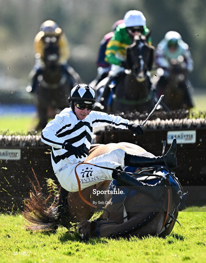 5 April 2026; Royal Soldier and jockey Donagh Meyler fall at the last during the Cawley Furniture Novice Handicap Hurdle during day two of the Fairyhouse Easter Festival at Fairyhouse Racecourse in Ratoath, Meath. Photo by Seb Daly/Sportsfile
