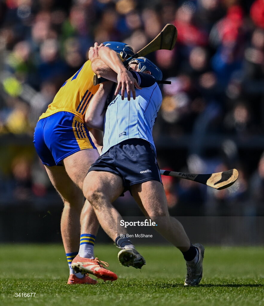 5 April 2026; Conor Burke of Dublin is tackled by Jack O'Neill of Clare during the Allianz Hurling League Division 1B final match between Clare and Dublin at TUS Gaelic Grounds in Limerick. Photo by Ben McShane/Sportsfile