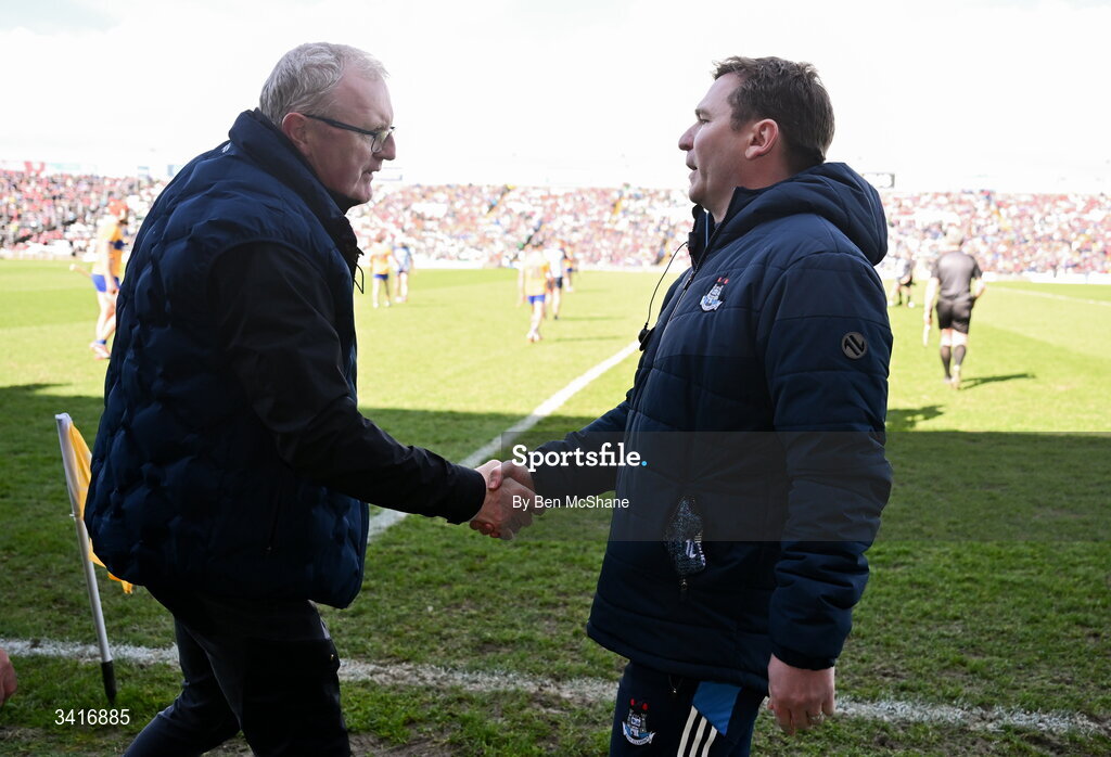 5 April 2026; Dublin manager Niall Ó Ceallacháin, right, and Clare manager Brian Lohan shake hands after the Allianz Hurling League Division 1B final match between Clare and Dublin at TUS Gaelic Grounds in Limerick. Photo by Ben McShane/Sportsfile
