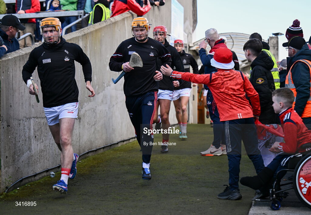 5 April 2026; Niall O'Leary, left, and Shane Barrett of Cork make their way on to the pitch before the Allianz Hurling League Division 1A final match between Limerick and Cork at TUS Gaelic Grounds in Limerick. Photo by Ben McShane/Sportsfile