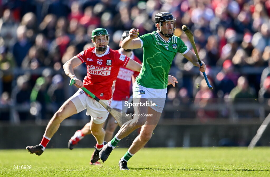 5 April 2026; Diarmaid Byrnes of Limerick in action against Séamus Harnedy of Cork during the Allianz Hurling League Division 1A final match between Limerick and Cork at TUS Gaelic Grounds in Limerick. Photo by Ben McShane/Sportsfile