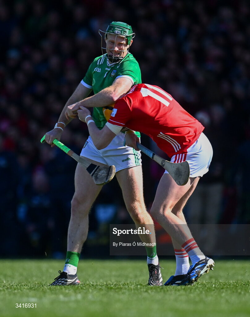 5 April 2026; William O'Donoghue of Limerick and Shane Barrett of Cork tussle at the start of the Allianz Hurling League Division 1A final match between Limerick and Cork at TUS Gaelic Grounds in Limerick. Photo by Piaras Ó Mídheach/Sportsfile
