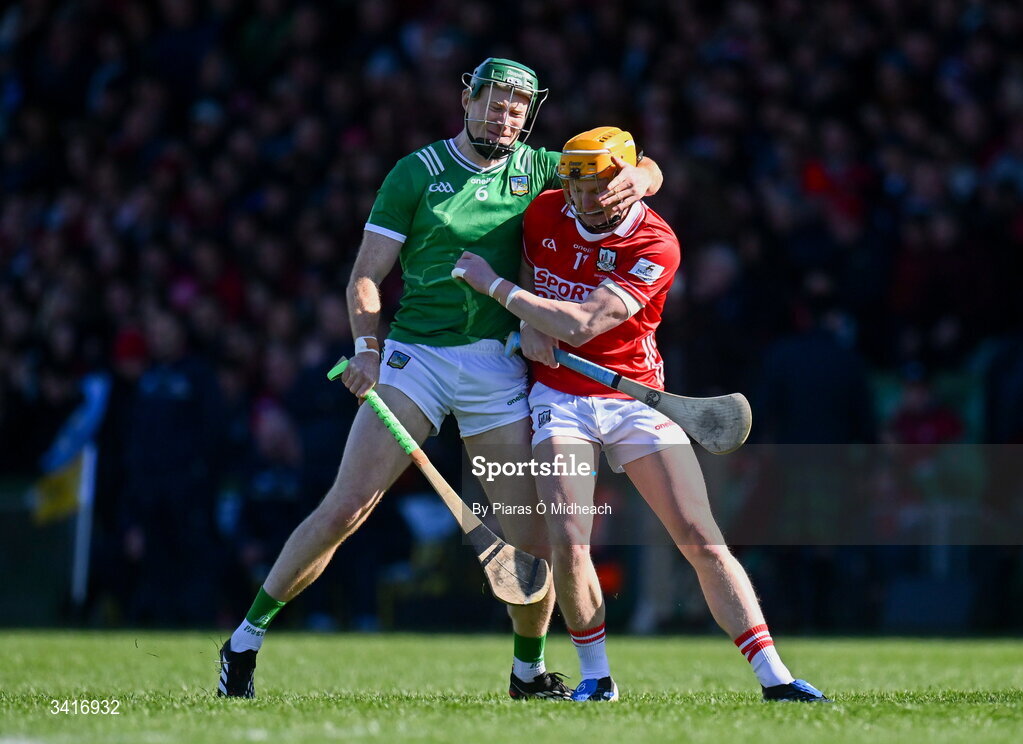 5 April 2026; William O'Donoghue of Limerick and Shane Barrett of Cork tussle at the start of the Allianz Hurling League Division 1A final match between Limerick and Cork at TUS Gaelic Grounds in Limerick. Photo by Piaras Ó Mídheach/Sportsfile