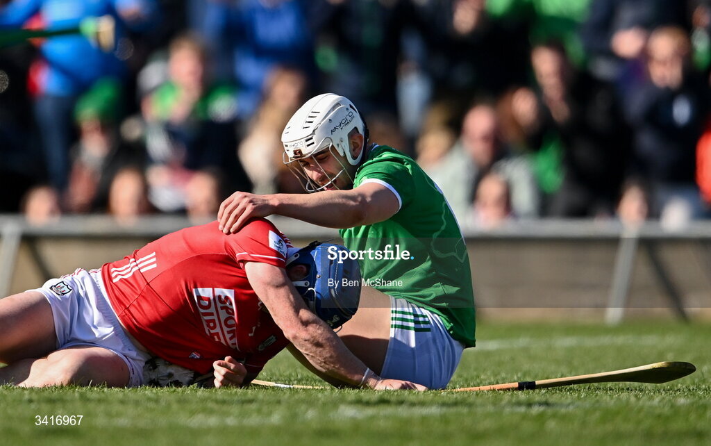 5 April 2026; Aaron Gillane of Limerick checks on Seán O'Donoghue of Cork, after scoring his side's first goal, during the Allianz Hurling League Division 1A final match between Limerick and Cork at TUS Gaelic Grounds in Limerick. Photo by Ben McShane/Sportsfile