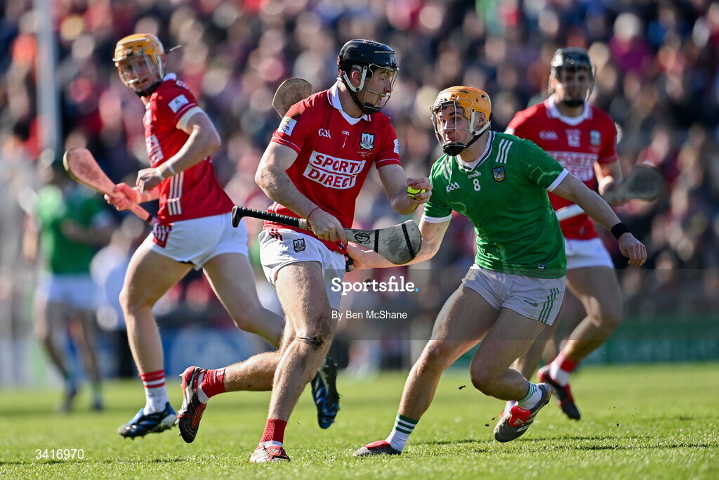 5 April 2026; Eoin Downey of Cork in action against Adam English of Limerick during the Allianz Hurling League Division 1A final match between Limerick and Cork at TUS Gaelic Grounds in Limerick. Photo by Ben McShane/Sportsfile