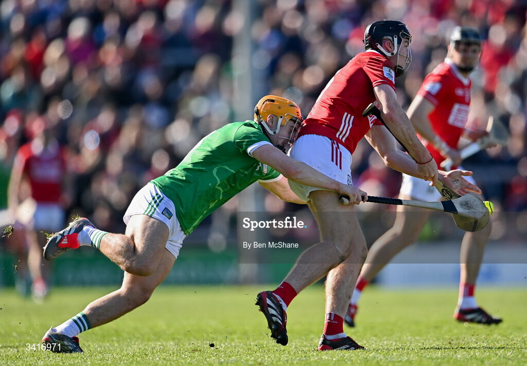 5 April 2026; Eoin Downey of Cork in action against Adam English of Limerick during the Allianz Hurling League Division 1A final match between Limerick and Cork at TUS Gaelic Grounds in Limerick. Photo by Ben McShane/Sportsfile