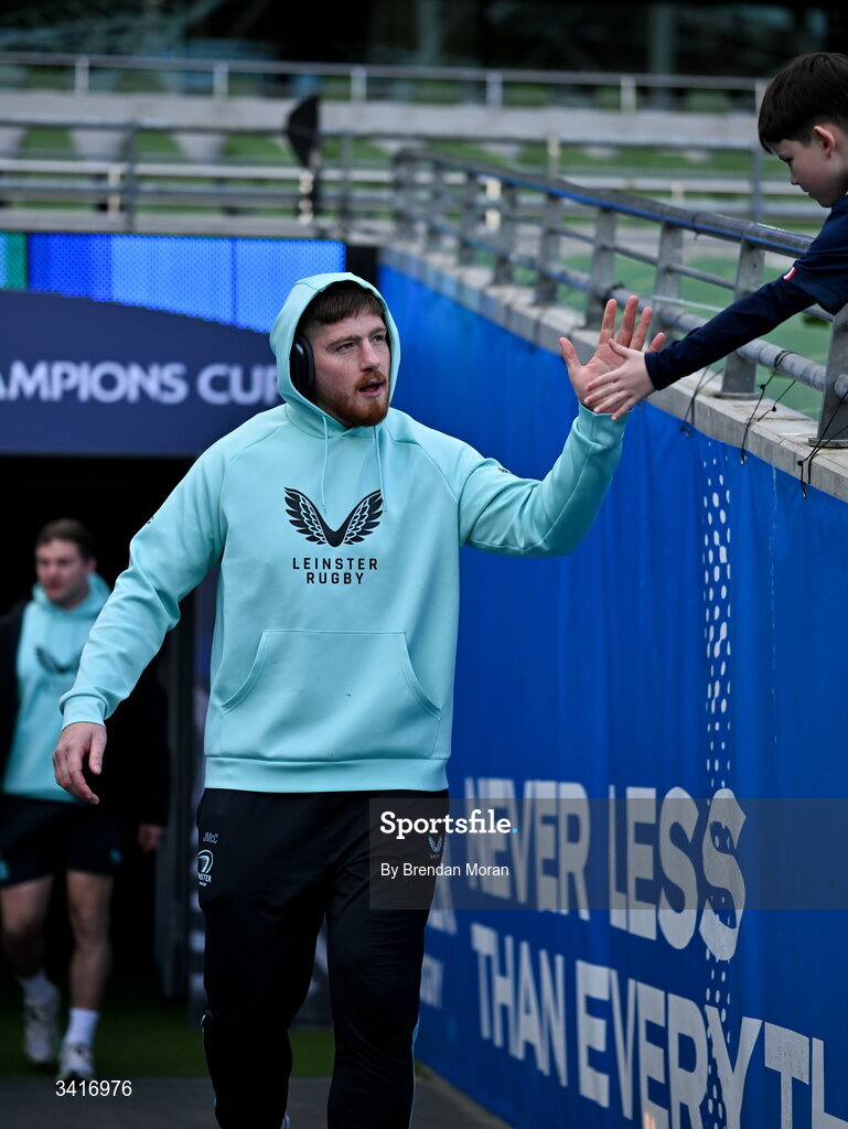 5 April 2026; Joe McCarthy of Leinster high fives a supporter on arrival before the Investec Champions Cup match between Leinster and Edinburgh at the Aviva Stadium in Dublin. Photo by Brendan Moran/Sportsfile