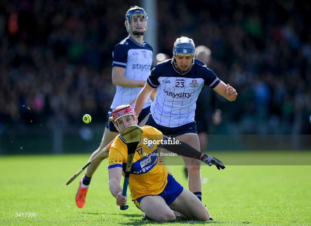 5 April 2026; John Conlon of Clare is tackled by Dara Purcell of Dublin during the Allianz Hurling League Division 1B final match between Clare and Dublin at TUS Gaelic Grounds in Limerick. Photo by John Sheridan/Sportsfile