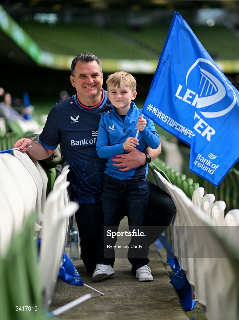 5 April 2026; Leinster fans Steven Harbott with Ethan, right, age 6, before the Investec Champions Cup match between Leinster and Edinburgh at the Aviva Stadium in Dublin. Photo by Ramsey Cardy/Sportsfile