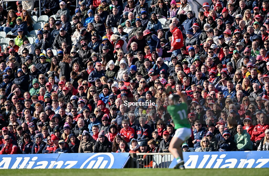 5 April 2026; Supporters look on as Aidan O'Connor of Limerick takes a free during the Allianz Hurling League Division 1A final match between Limerick and Cork at TUS Gaelic Grounds in Limerick. Photo by Ben McShane/Sportsfile
