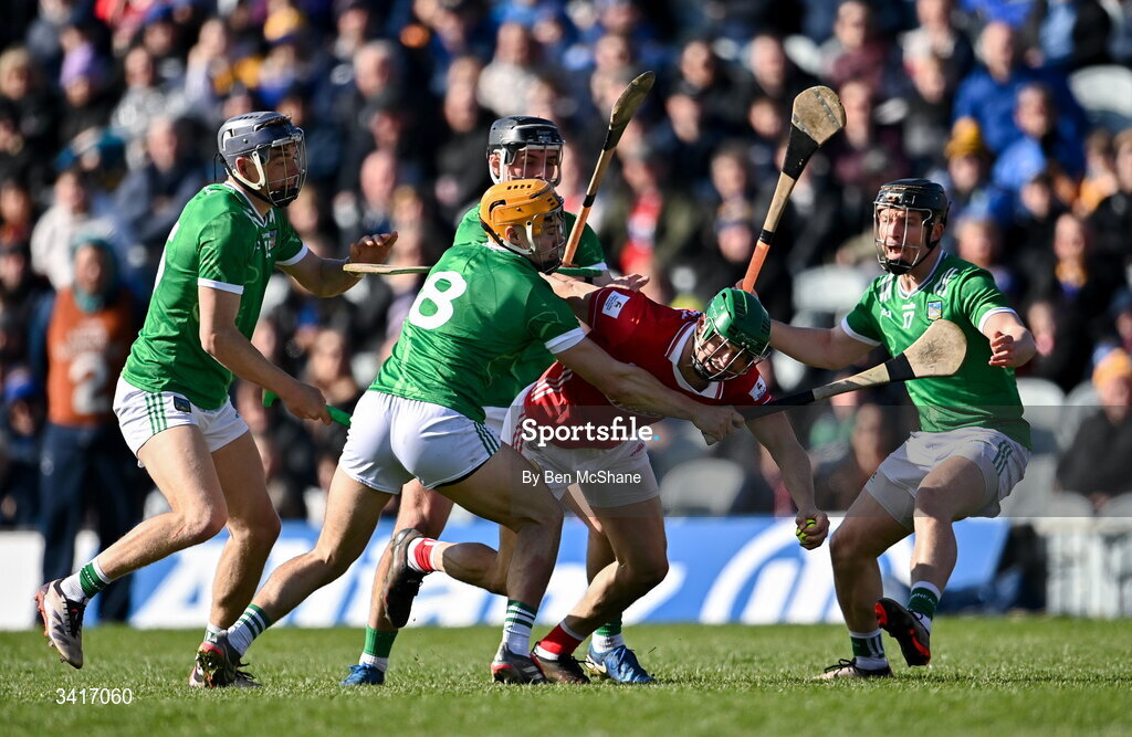 5 April 2026; Séamus Harnedy of Cork in action against Limerick players, from left, David Reidy, Adam English, Aidan O'Connor and Peter Casey during the Allianz Hurling League Division 1A final match between Limerick and Cork at TUS Gaelic Grounds in Limerick. Photo by Ben McShane/Sportsfile