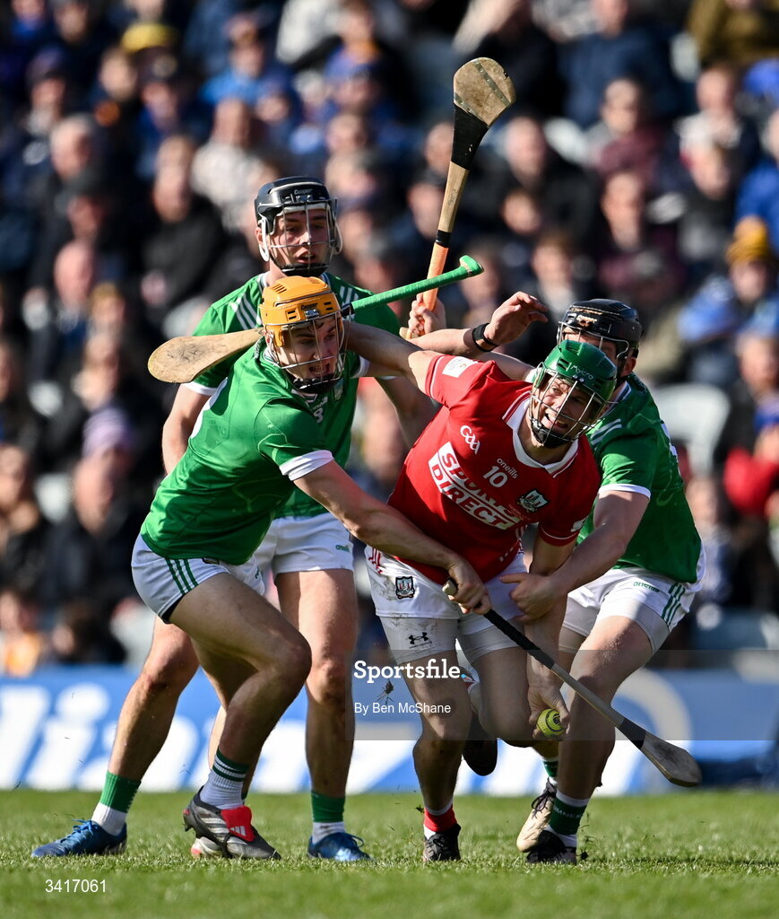 5 April 2026; Séamus Harnedy of Cork in action against Limerick players, from left, Adam English, Aidan O'Connor and Peter Casey during the Allianz Hurling League Division 1A final match between Limerick and Cork at TUS Gaelic Grounds in Limerick. Photo by Ben McShane/Sportsfile