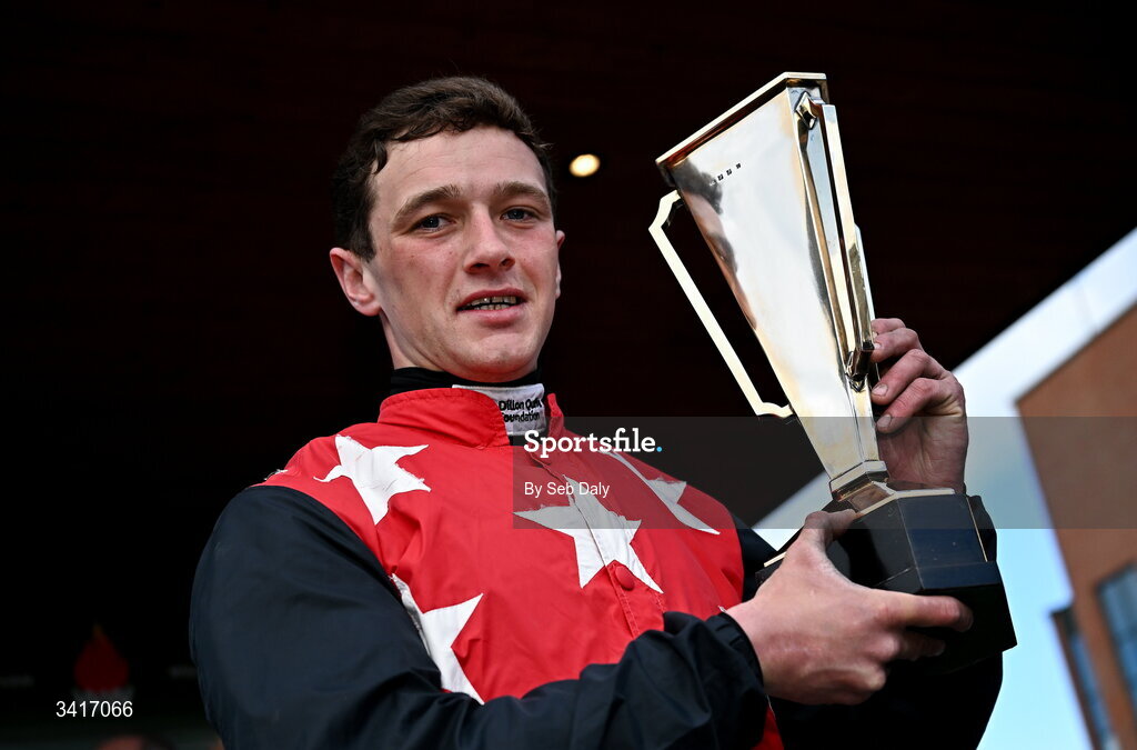 5 April 2026; Jockey Cian Quirke celebrates with the trophy after winning the WillowWarm Gold Cup on Fleur In The Park during day two of the Fairyhouse Easter Festival at Fairyhouse Racecourse in Ratoath, Meath. Photo by Seb Daly/Sportsfile