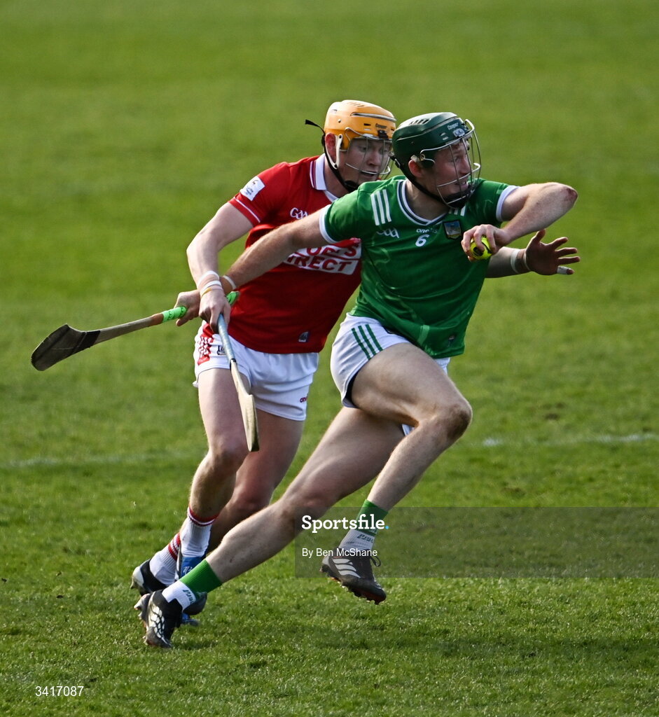 5 April 2026; William O'Donoghue of Limerick is tackled by Shane Barrett of Cork during the Allianz Hurling League Division 1A final match between Limerick and Cork at TUS Gaelic Grounds in Limerick. Photo by Ben McShane/Sportsfile