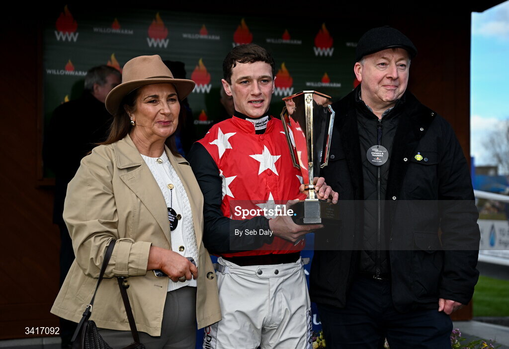 5 April 2026; Jockey Cian Quirke with his parents Aisling and Maurice after winning the WillowWarm Gold Cup on Fleur In The Park during day two of the Fairyhouse Easter Festival at Fairyhouse Racecourse in Ratoath, Meath. Photo by Seb Daly/Sportsfile