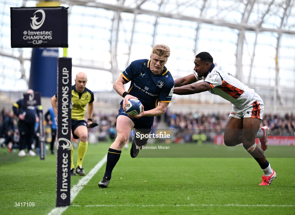 5 April 2026; Tommy O'Brien of Leinster beats the tackle of Malelili Satala of Edinburgh on the way to scoring scores his and his side's second try during the Investec Champions Cup match between Leinster and Edinburgh at the Aviva Stadium in Dublin. Photo by Brendan Moran/Sportsfile