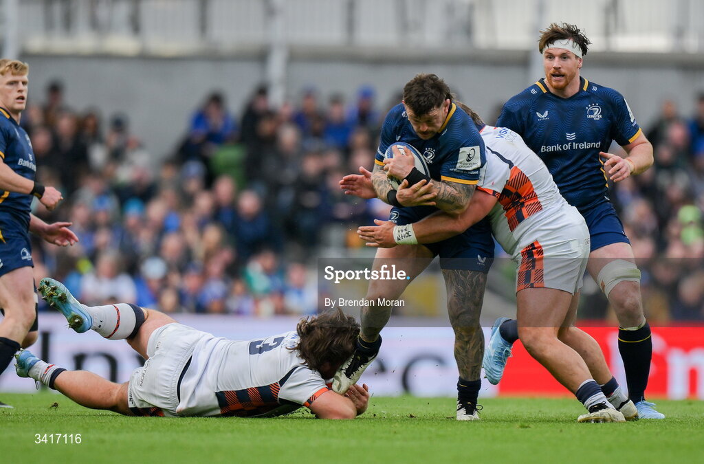 5 April 2026; Andrew Porter of Leinster tackled by D'Arcy Rae and Pierre Schoeman of Edinburgh during the Investec Champions Cup match between Leinster and Edinburgh at the Aviva Stadium in Dublin. Photo by Brendan Moran/Sportsfile