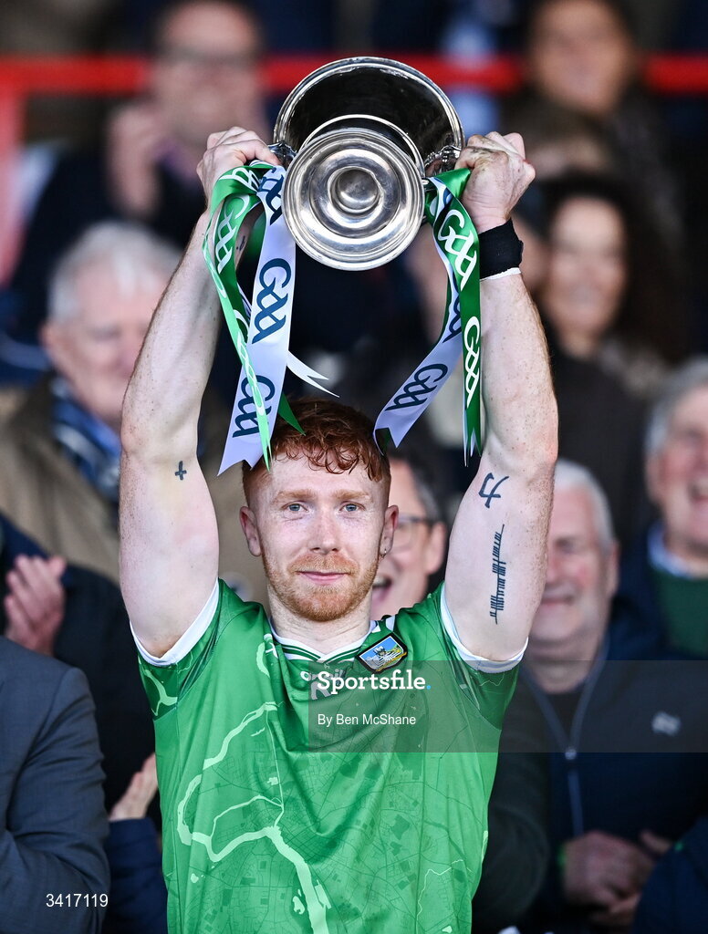 5 April 2026; Limerick captain Cian Lynch lifts the cup after the Allianz Hurling League Division 1A final match between Limerick and Cork at TUS Gaelic Grounds in Limerick. Photo by Ben McShane/Sportsfile