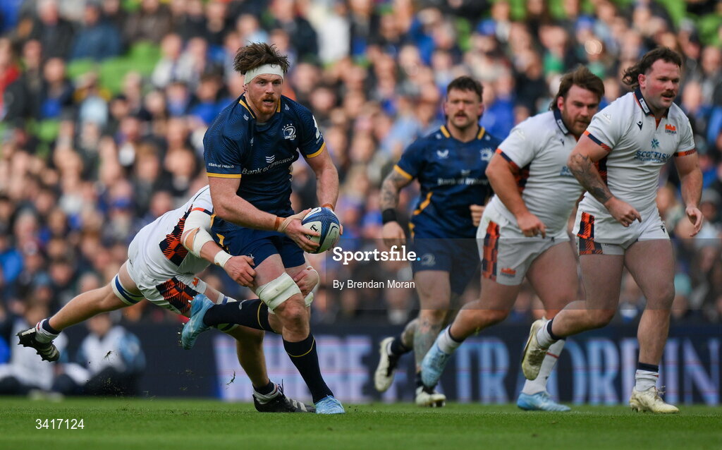 5 April 2026; Ryan Baird of Leinster is tackled by Dylan Richardson of Edinburgh during the Investec Champions Cup match between Leinster and Edinburgh at the Aviva Stadium in Dublin. Photo by Brendan Moran/Sportsfile
