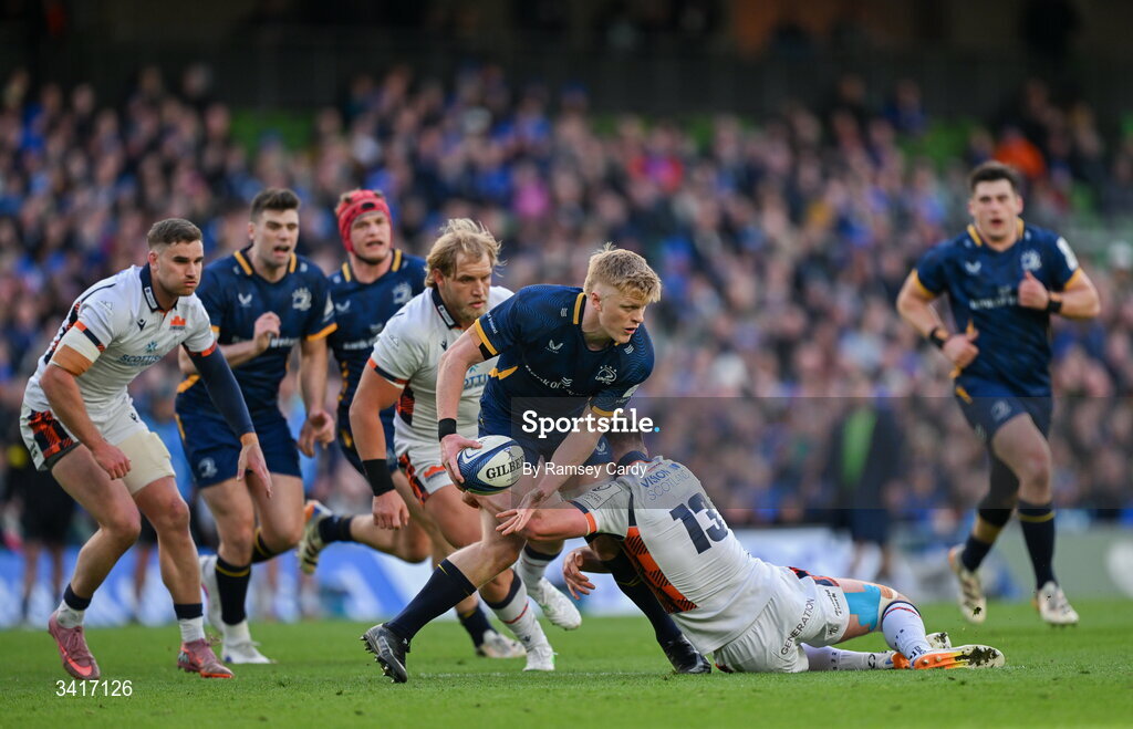 5 April 2026; Tommy O'Brien of Leinster is tackled by Matt Currie of Edinburgh during the Investec Champions Cup match between Leinster and Edinburgh at the Aviva Stadium in Dublin. Photo by Ramsey Cardy/Sportsfile