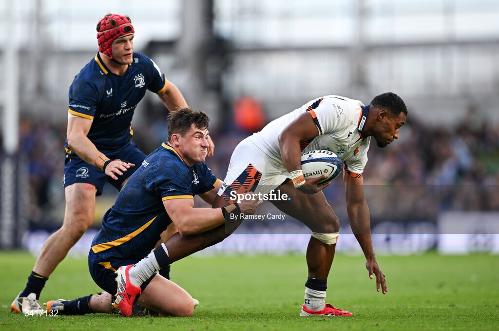 5 April 2026; Malelili Satala of Edinburgh is tackled by Dan Sheehan of Leinster during the Investec Champions Cup match between Leinster and Edinburgh at the Aviva Stadium in Dublin. Photo by Ramsey Cardy/Sportsfile