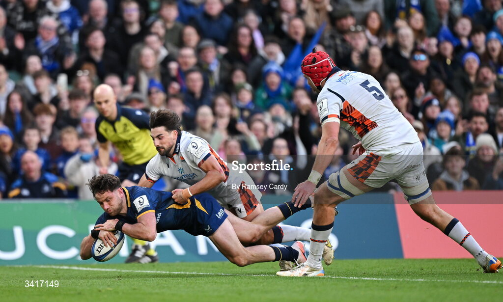 5 April 2026; Hugo Keenan of Leinster dives over to score his side's fourth try during the Investec Champions Cup match between Leinster and Edinburgh at the Aviva Stadium in Dublin. Photo by Ramsey Cardy/Sportsfile
