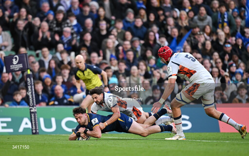 5 April 2026; Hugo Keenan of Leinster dives over to score his side's fourth try during the Investec Champions Cup match between Leinster and Edinburgh at the Aviva Stadium in Dublin. Photo by Ramsey Cardy/Sportsfile