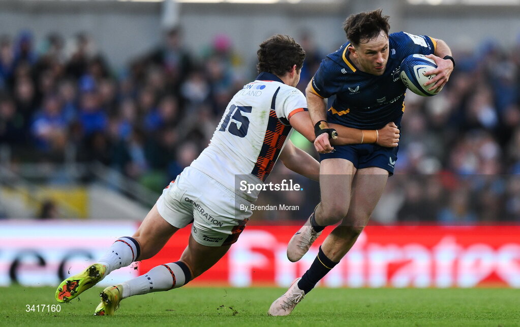 5 April 2026; Hugo Keenan of Leinster is tackled by Piers O’Conor of Edinburgh during the Investec Champions Cup match between Leinster and Edinburgh at the Aviva Stadium in Dublin. Photo by Brendan Moran/Sportsfile