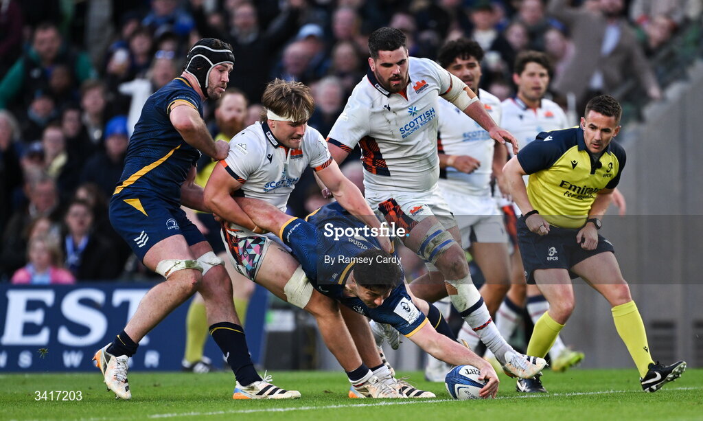 5 April 2026; Thomas Clarkson of Leinster scores his side's sixth try despite the attention of Freddy Douglas of Edinburgh during the Investec Champions Cup match between Leinster and Edinburgh at the Aviva Stadium in Dublin. Photo by Ramsey Cardy/Sportsfile