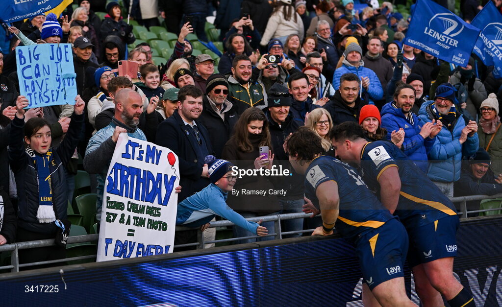 5 April 2026; Alex Usanov and Thomas Clarkson of Leinster with supporters after the Investec Champions Cup match between Leinster and Edinburgh at the Aviva Stadium in Dublin. Photo by Ramsey Cardy/Sportsfile