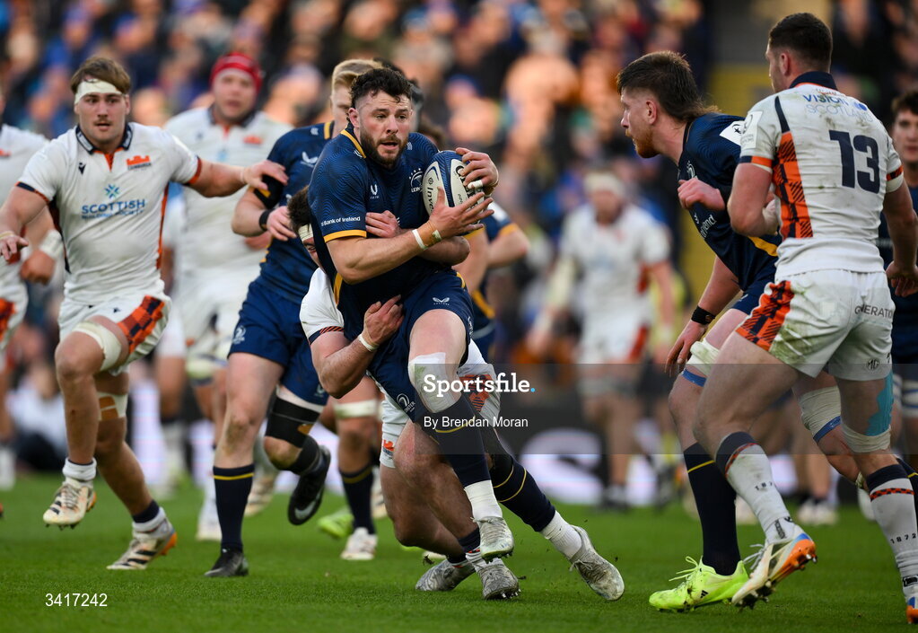 5 April 2026; Robbie Henshaw of Leinster is tackled by Jerry Blyth-Lafferty of Edinburgh during the Investec Champions Cup match between Leinster and Edinburgh at the Aviva Stadium in Dublin. Photo by Brendan Moran/Sportsfile