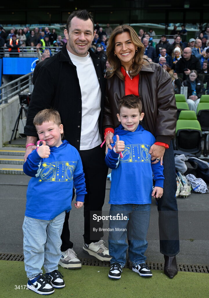 5 April 2026; Leinster record cap holder Cian Healy with his wife Laura and children Beau and Russell as he is introduced to the crowd for a presentation at half-time in the Investec Champions Cup match between Leinster and Edinburgh at the Aviva Stadium in Dublin. Photo by Brendan Moran/Sportsfile