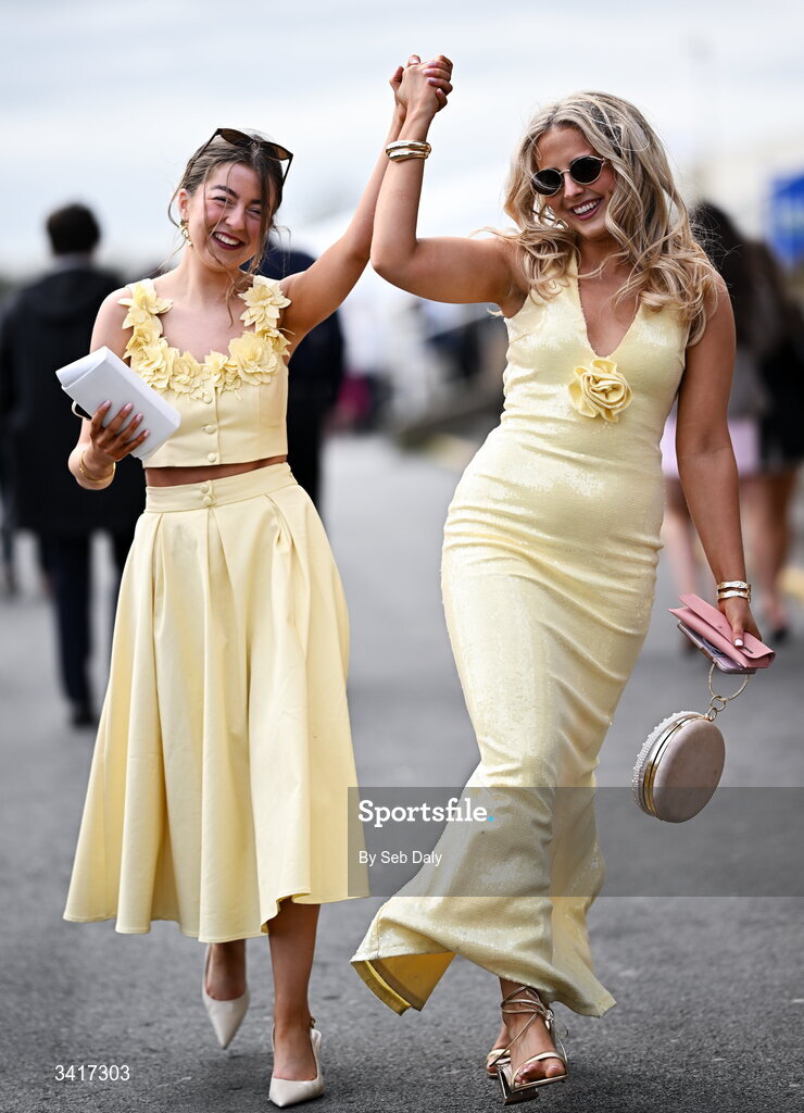6 April 2026; Racegoers Roisin Daly, left, from Crossmaglen, Armagh, and Ella Rooney, from Hilltown, Down, ahead of racing on day three of the Fairyhouse Easter Festival at Fairyhouse Racecourse in Ratoath, Meath. Photo by Seb Daly/Sportsfile