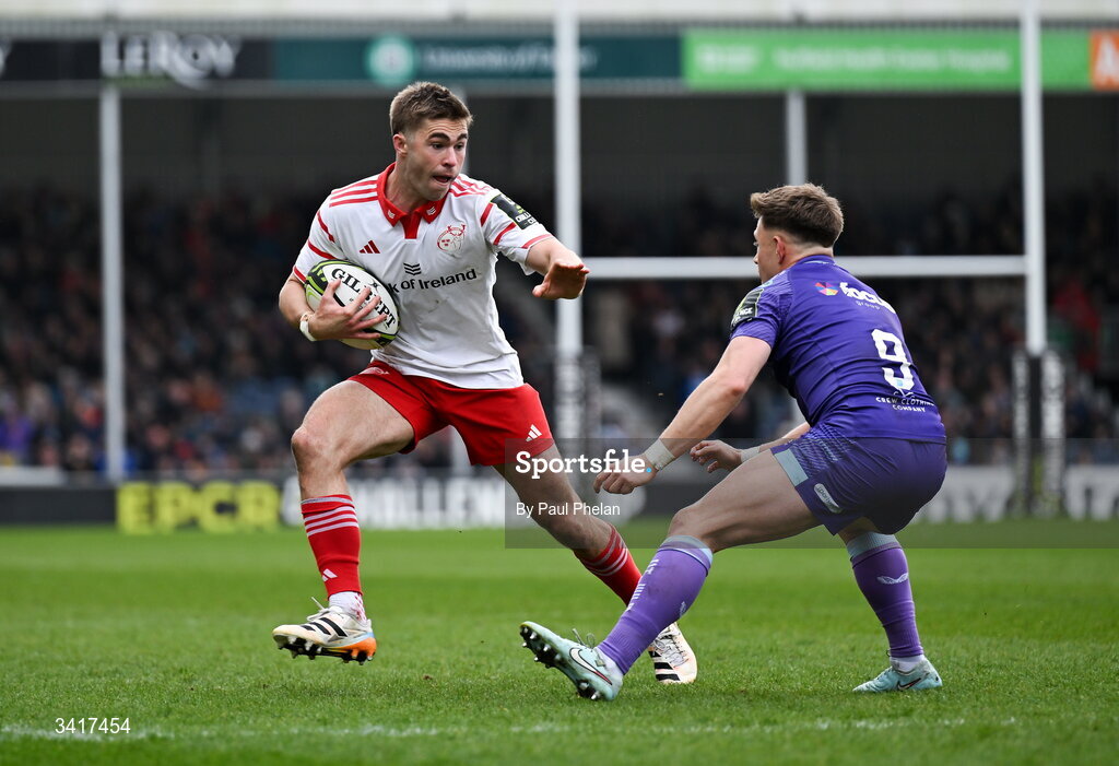 4 April 2026; Jack Crowley of Munster Rugby ,despite the tackle of Steve Varney of Exeter Chiefs, on his way to scoring his sides first try during the EPCR Challenge Cup match between Exeter Chiefs and Munster at Sandy Park in Exeter, England. Photo by Paul Phelan/Sportsfile