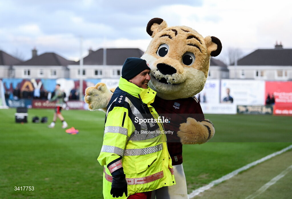 3 April 2026; Galway United mascot Terry the Tiger with a member of the Irish Red Cross before the SSE Airtricity Men's Premier Division match between Galway United and Derry City at Eamonn Deacy Park in Galway. Photo by Stephen McCarthy/Sportsfile