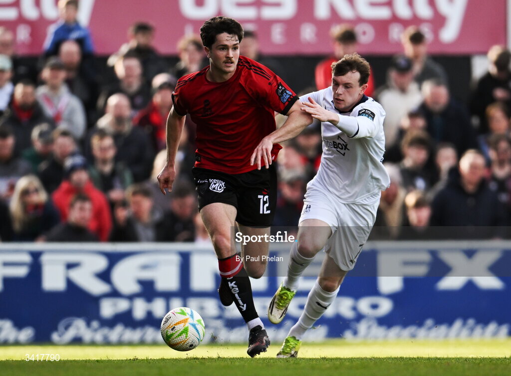 6 April 2026; Patrick Hickey of Bohemians in action against Conor Carty of Waterford during the SSE Airtricity Men's Premier Division match between Bohemians and Waterford at Dalymount Park in Dublin. Photo by Paul Phelan/Sportsfile