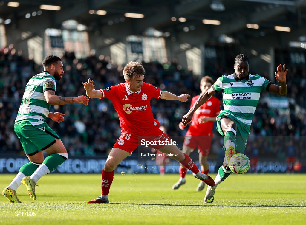 6 April 2026; James Norris of Shelbourne in action against Shamrock Rovers players Jake Mulraney, left, and Tunmise Sobowale during the SSE Airtricity Men's Premier Division match between Shamrock Rovers and Shelbourne at Tallaght Stadium in Dublin. Photo by Thomas Flinkow/Sportsfile