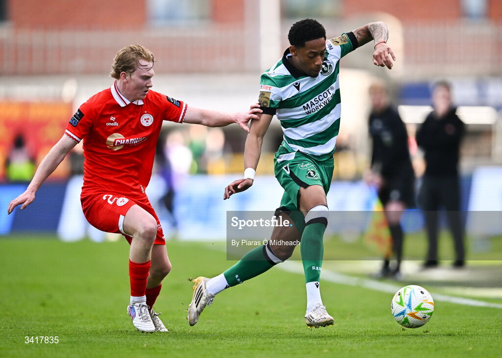6 April 2026; Maleace Asamoah of Shamrock Rovers in action against Jack Henry-Francis of Shelbourne during the SSE Airtricity Men's Premier Division match between Shamrock Rovers and Shelbourne at Tallaght Stadium in Dublin. Photo by Piaras Ó Mídheach/Sportsfile