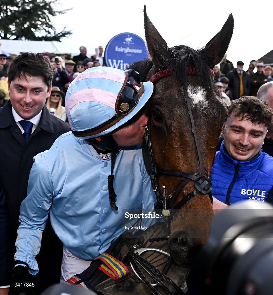 6 April 2026; Jockey Donagh Meyler kisses Soldier In Milan after winning the BOYLE Sports Irish Grand National Steeplechase during day three of the Fairyhouse Easter Festival at Fairyhouse Racecourse in Ratoath, Meath. Photo by Seb Daly/Sportsfile