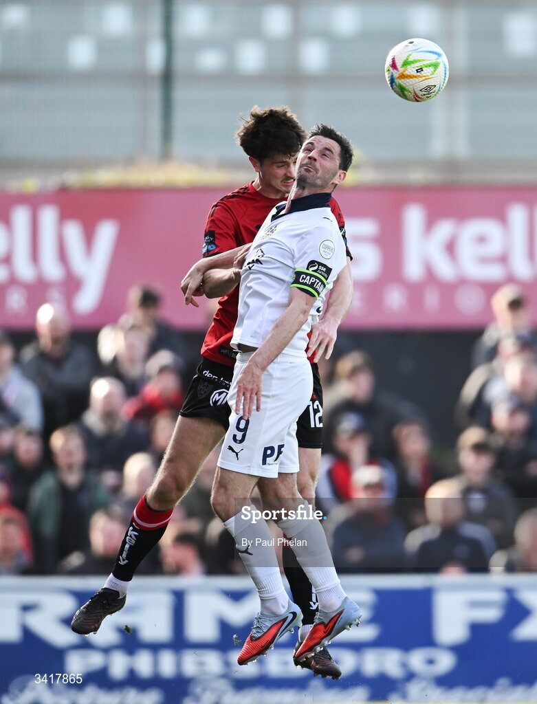 6 April 2026; Patrick Hickey of Bohemians in action against Pádraig Amond of Waterford during the SSE Airtricity Men's Premier Division match between Bohemians and Waterford at Dalymount Park in Dublin. Photo by Paul Phelan/Sportsfile