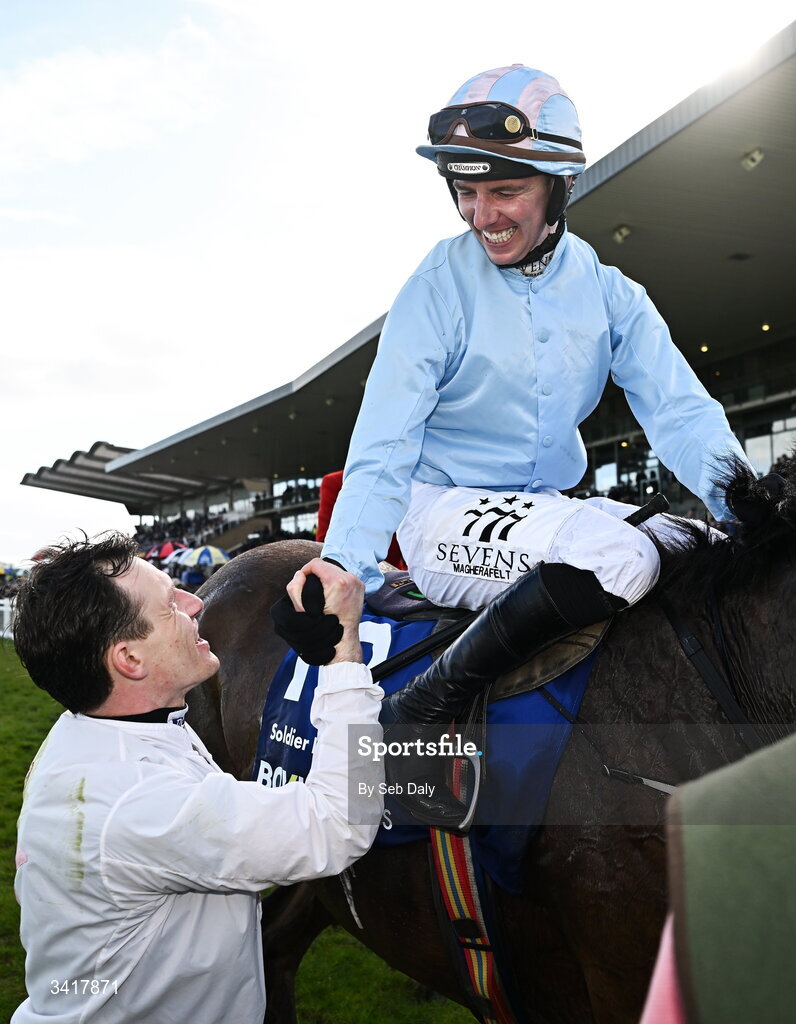 6 April 2026; Jockey Donagh Meyler, right, is congratulated by fellow jockey Paul Townend after winning the BOYLE Sports Irish Grand National Steeplechase on Soldier In Milan during day three of the Fairyhouse Easter Festival at Fairyhouse Racecourse in Ratoath, Meath. Photo by Seb Daly/Sportsfile