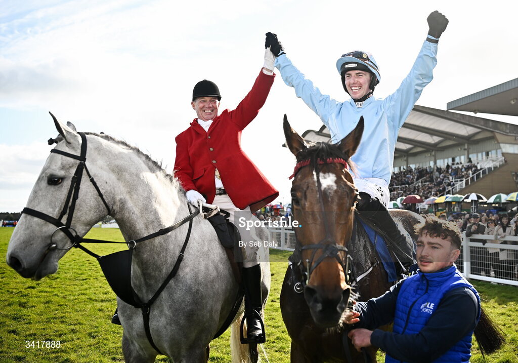 6 April 2026; Jockey Donagh Meyler, right, is congratulated by former Irish National Hunt jockey, and previous Irish Grand National Steeplechase winner, Paul Carberry, after winning the BOYLE Sports Irish Grand National Steeplechase on Soldier In Milan during day three of the Fairyhouse Easter Festival at Fairyhouse Racecourse in Ratoath, Meath. Photo by Seb Daly/Sportsfile