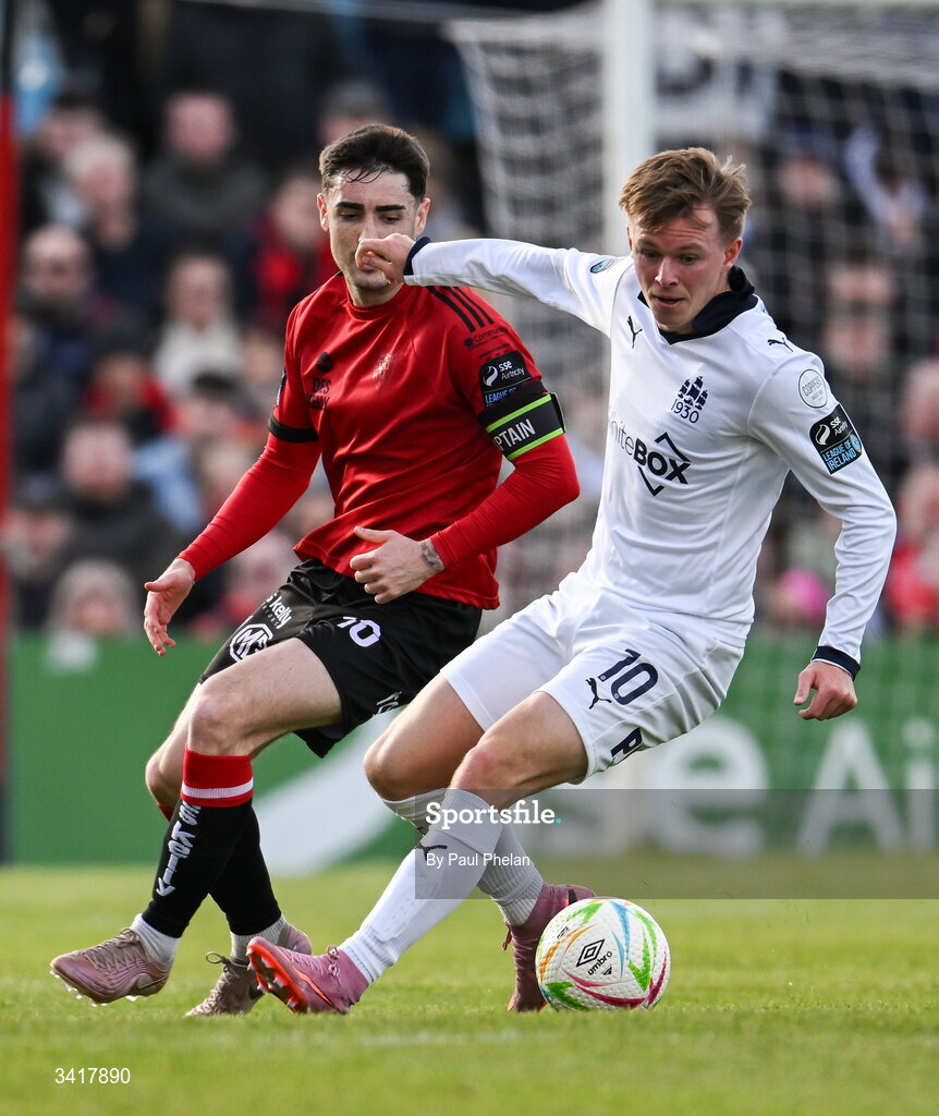 6 April 2026; Conan Noonan of Waterford in action against Dawson Devoy of Bohemians during the SSE Airtricity Men's Premier Division match between Bohemians and Waterford at Dalymount Park in Dublin. Photo by Paul Phelan/Sportsfile