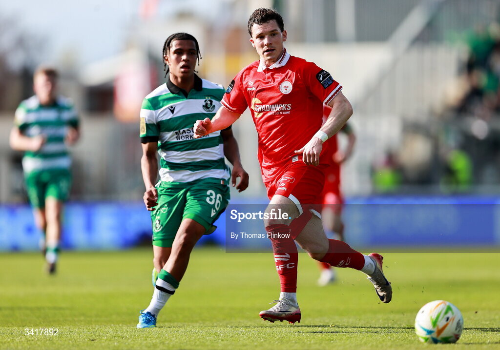6 April 2026; Ali Coote of Shelbourne in action against Victor Ozhianvuna of Shamrock Rovers during the SSE Airtricity Men's Premier Division match between Shamrock Rovers and Shelbourne at Tallaght Stadium in Dublin. Photo by Thomas Flinkow/Sportsfile