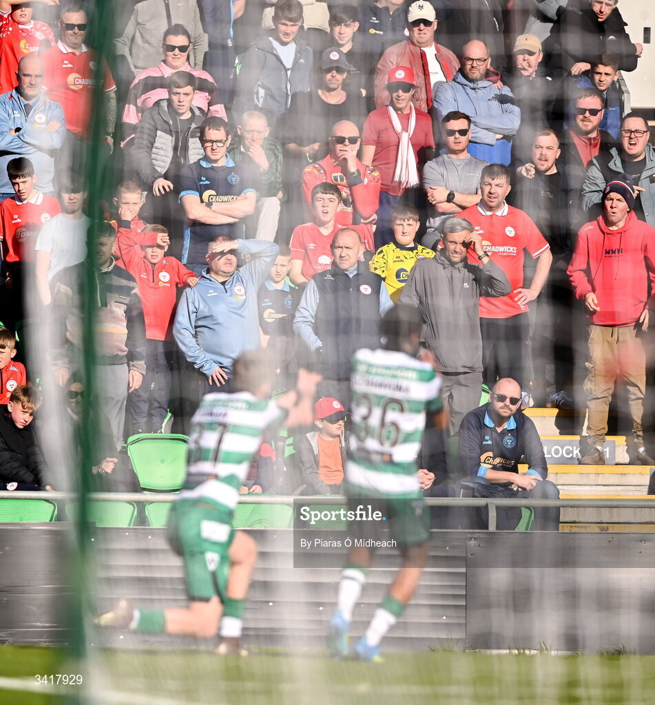 6 April 2026; Michael Noonan of Shamrock Rovers, left, celebrates in front of the Shelbourne supporters with team-mate Victor Ozhianvuna after scoring his side's second goal during the SSE Airtricity Men's Premier Division match between Shamrock Rovers and Shelbourne at Tallaght Stadium in Dublin. Photo by Piaras Ó Mídheach/Sportsfile