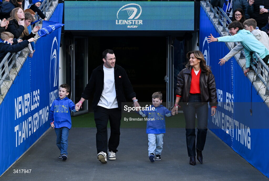 5 April 2026; Leinster record cap holder Cian Healy, accompanied by his wife Laura and children Russell and Beau, makes his way onto the pitch to be recognised by supporters at half-time during the Investec Champions Cup match between Leinster and Edinburgh at the Aviva Stadium in Dublin. Photo by Brendan Moran/Sportsfile