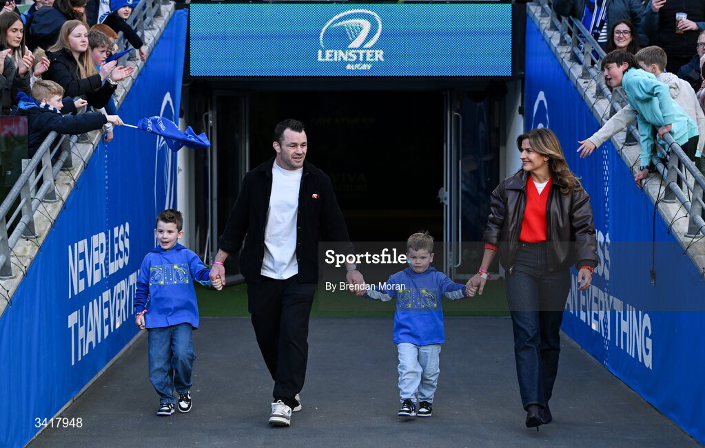 5 April 2026; Leinster record cap holder Cian Healy, accompanied by his wife Laura and children Russell and Beau, makes his way onto the pitch to be recognised by supporters at half-time during the Investec Champions Cup match between Leinster and Edinburgh at the Aviva Stadium in Dublin. Photo by Brendan Moran/Sportsfile