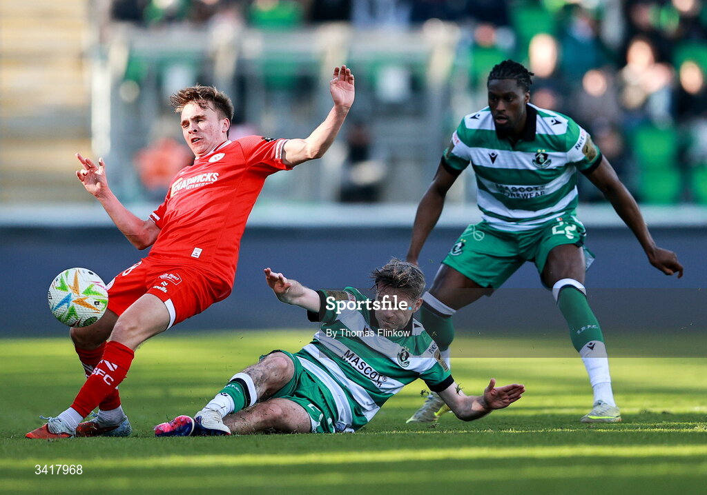 6 April 2026; James Norris of Shelbourne is tackled by Jack Byrne of Shamrock Rovers during the SSE Airtricity Men's Premier Division match between Shamrock Rovers and Shelbourne at Tallaght Stadium in Dublin. Photo by Thomas Flinkow/Sportsfile