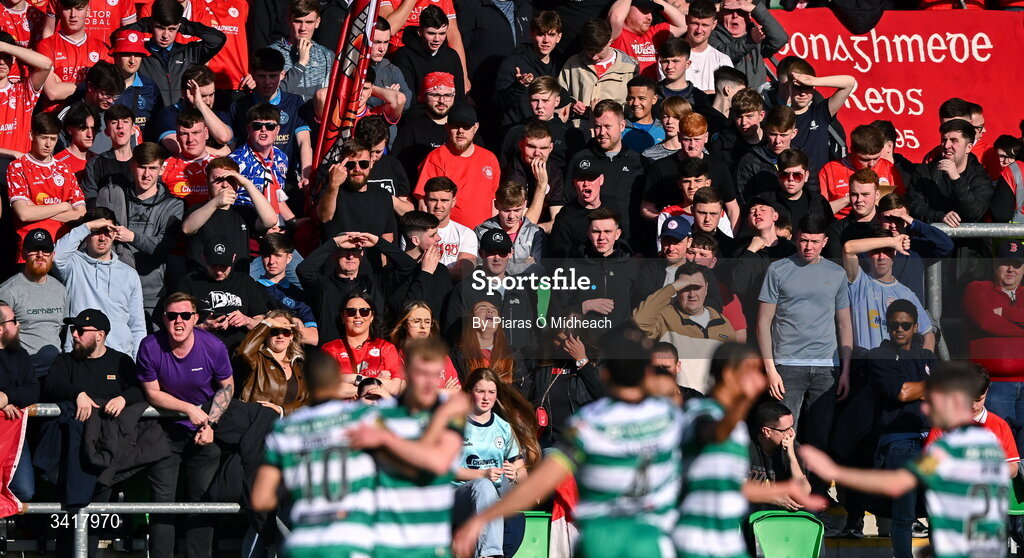 6 April 2026; (EDITOR'S NOTE; Image contains profanity) Shelbourne supporters react as Shamrock Rovers players celebrate their side's second goal, scored by Michael Noonan, during the SSE Airtricity Men's Premier Division match between Shamrock Rovers and Shelbourne at Tallaght Stadium in Dublin. Photo by Piaras Ó Mídheach/Sportsfile